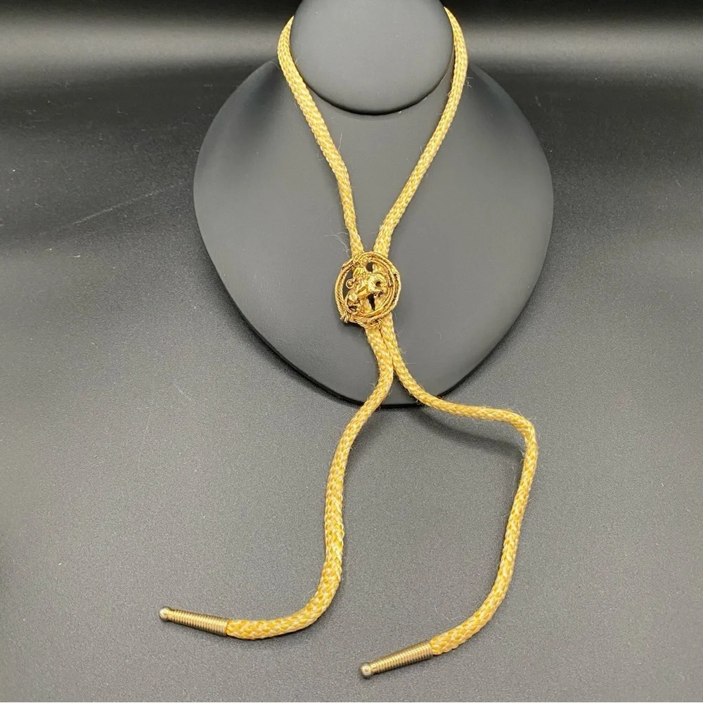 Gold Tone Bolo Tie with Riding Bronco